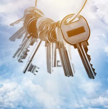 Set of metal keys on ring in sky Stock Photos