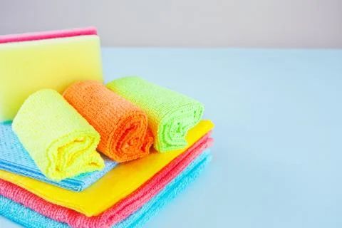 Set of Microfiber cleaning towels over blue background Stock Photos