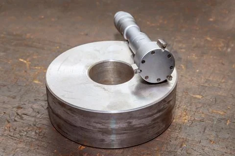 A set of micrometers for accurate measurement of different hole sizes. Stock Photos