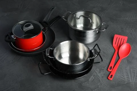 Set of modern clean kitchenware on color background Stock Photos