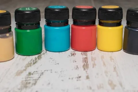 A set of multi-colored cans of paint for drawing Stock Photos