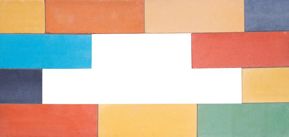 A set of the multi-colored ceramic bricks made in a wall with window Foto stock
