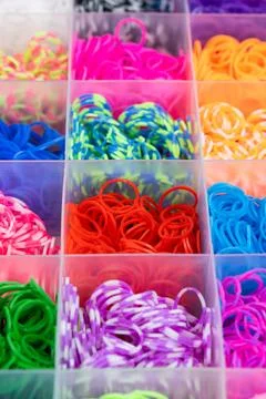 A set of multi-colored elastic bands for weaving bracelets for children. Stock Photos