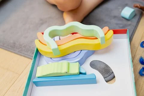 Set of multi-colored foam learning shapes placed inside toy tray Stock Photos
