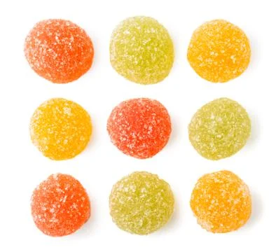 Set of multi-colored marmalade sprinkled with sugar on a white. The form of the Stock Photos