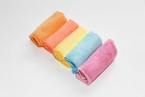 Set of multi-colored microfiber rags for cleaning. Stock Photos