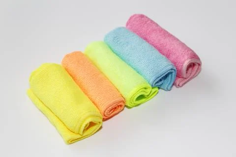 Set of multi-colored microfiber rags for cleaning. Stock Photos
