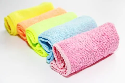 Set of multi-colored microfiber rags for cleaning. Stock Photos