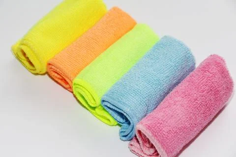 Set of multi-colored microfiber rags for cleaning. Stock Photos