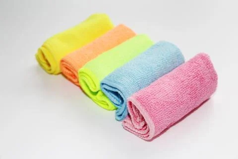 Set of multi-colored microfiber rags for cleaning. Stock Photos