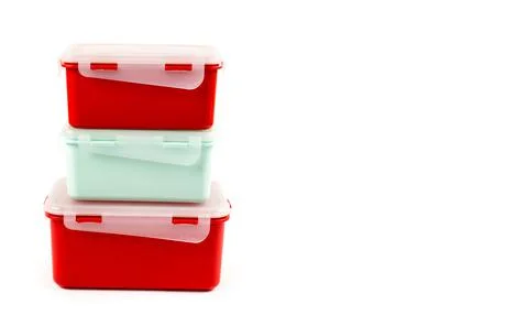 A set of multi-colored plastic containers for easy storage of food Stock Photos