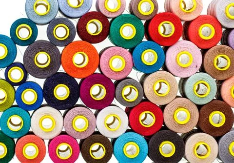 Set of multi-colored spools of thread for sewing Stock Photos