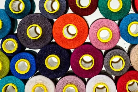 Set of multi-colored spools of thread for sewing 写真素材