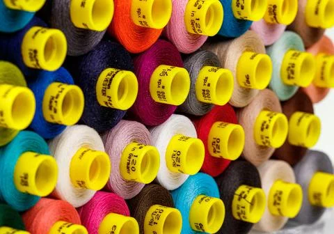 Set of multi-colored spools of thread for sewing Stock Photos