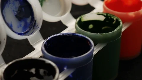 Set of multi colors gouache on plastic jars.  Rotation multicolor background. Stock Footage 106565714