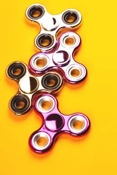 Set of multicolored fidget spinners Stock Photos