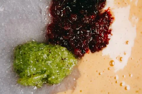 Set multicolored smears of scrub with exfoliating particles. Stock Photos