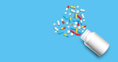 Set of multicolored tablets and assorted capsules Illustrazione stock