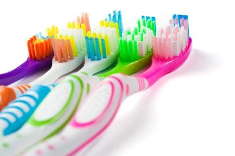 Set of multicolored toothbrushes isolated on white Stock Photos