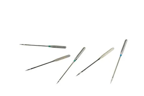 Set of needles for sewing-machine isolated on white background Stock Photos