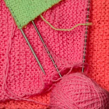 Set for needlework knitting needles, wool yarn, scarf. Stock Photos