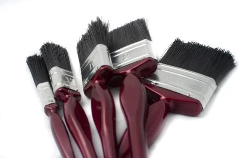 Set of new paintbrushes in different sizes Stock Photos