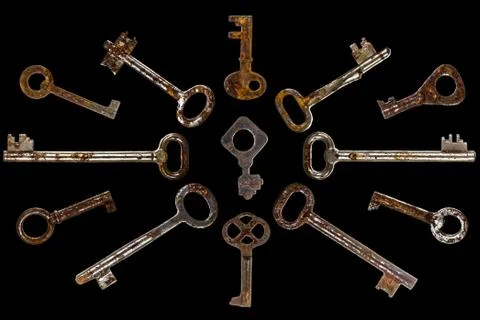 Set of old keys, isolated on black background Stock Photos