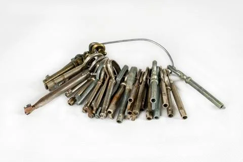 A set of old keys. Isolated over white background Stock Photos