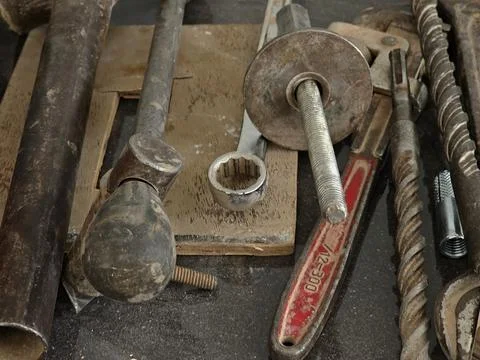 Set of Old Metal Tools on a Workbench A collection of old metal tools Stock Photos