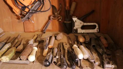 A set of old screwdrivers on a workshop shelf Stock Photos