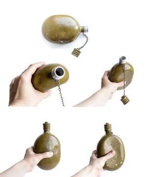 Set of old time-worn soldier flasks isolated on a white background. Hand hold Stock Photos