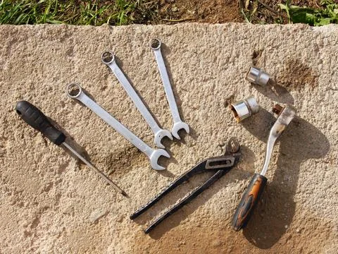 A set of old tools: wrenches, ratchet, screwdrivers, pliers, cap wrenches Stock Photos