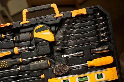 A set of open-end wrenches of different sizes fixed in the locksmith tool cradle Stock Photos