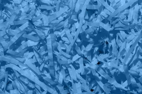 Set of orange thin paper confetti photographed close-up. Stock Photos