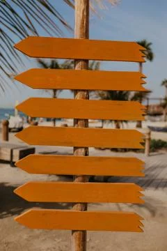 Set of orange wooden arrow pointers- Image Stock Photos