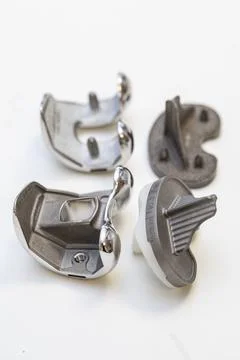 Set of orthopedic knee replacement implants on white background Stock Photos