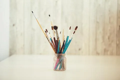 Set of paint brushes in the pot Stock Photos