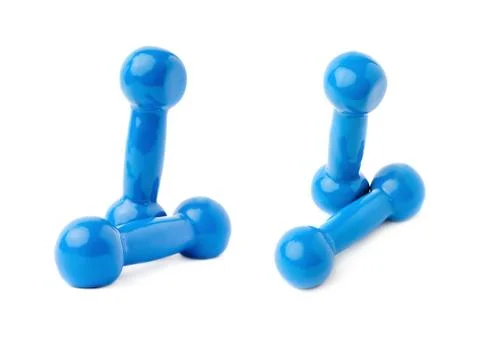 Set of Pair Plastic coated dumbells isolated over the white background Fotos Stock