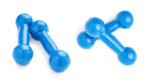 Set of Pair Plastic coated dumbells isolated over the white background Stock Photos