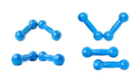 Set of Pair Plastic coated dumbells isolated over the white background Fotos Stock