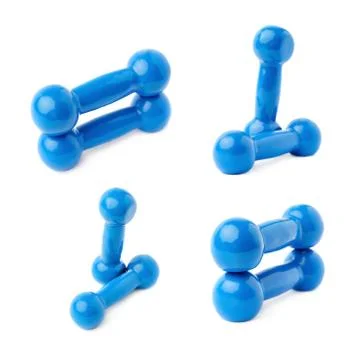 Set of Pair Plastic coated dumbells isolated over the white background Fotos Stock