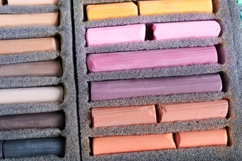 Set of pastel crayons in box, close-up Stock Photos