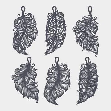 Set of pendants in the shape of leaf, feather.  Illustrazione stock