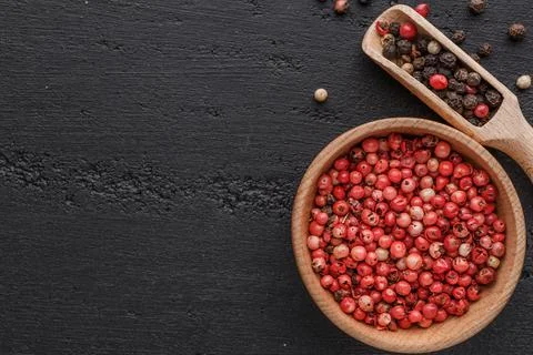 A set of peppers.Collage of different type pepper, Black ,white, pink and all Stock Photos