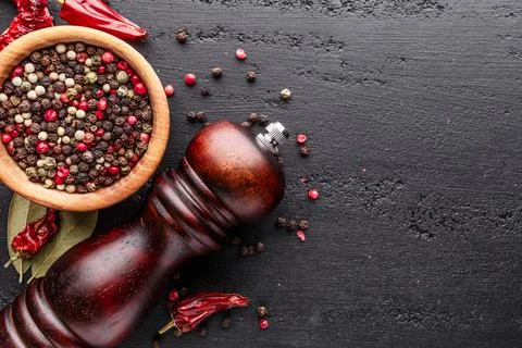 A set of peppers.Collage of different type pepper, Black ,white, pink and all Stock Photos