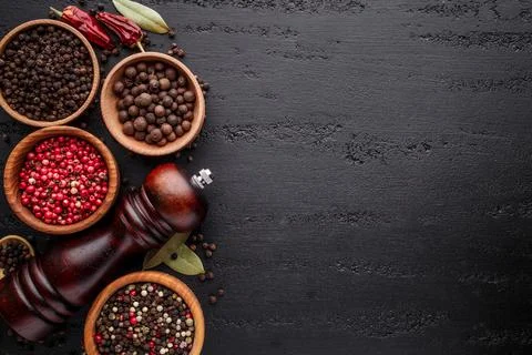A set of peppers.Collage of different type pepper, Black ,white, pink and all Stock Photos