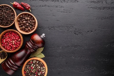 A set of peppers.Collage of different type pepper, Black ,white, pink and all Stock Photos