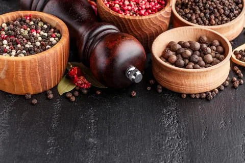 A set of peppers.Collage of different type pepper, Black ,white, pink and all Stock Photos