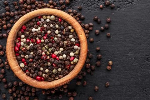 A set of peppers.Collage of different type pepper, Black ,white, pink and all Stock Photos