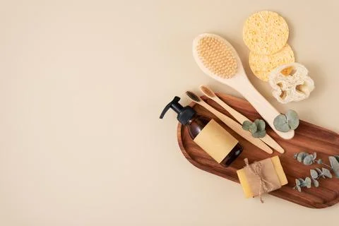Set of personal care items including a bamboo toothbrush, soap bar, clean bru Stock Photos